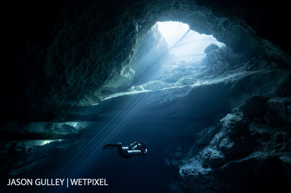 A rebreather diver heads toward the surface following a 3-hour dive in booming underwater passages.