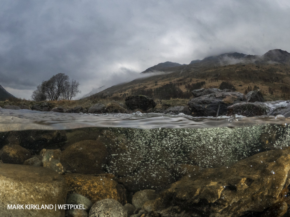 Split-level shot of Glen Kinglas, Scotland.