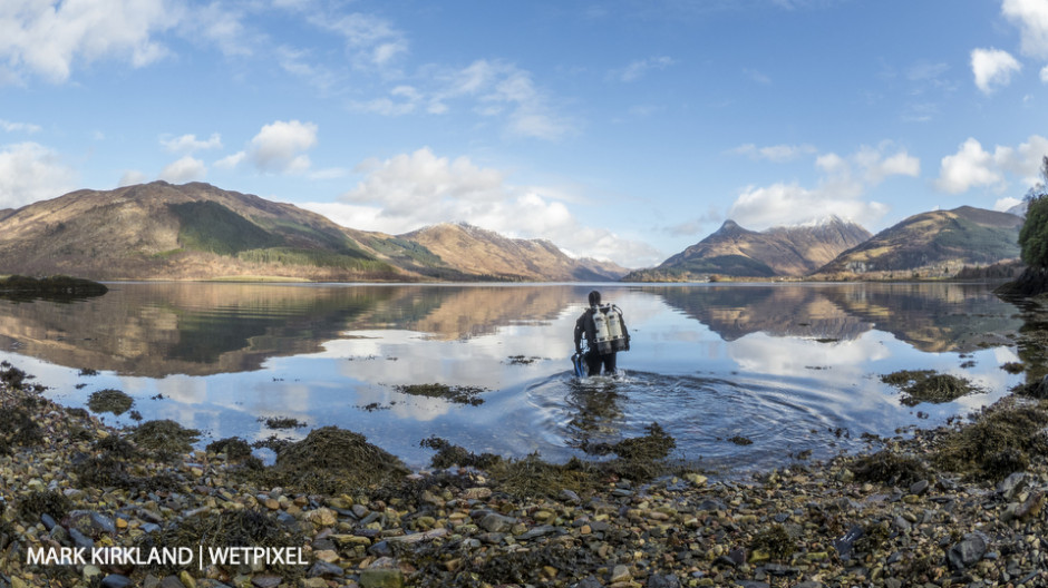 Diver entering Loch Leven, Scotland