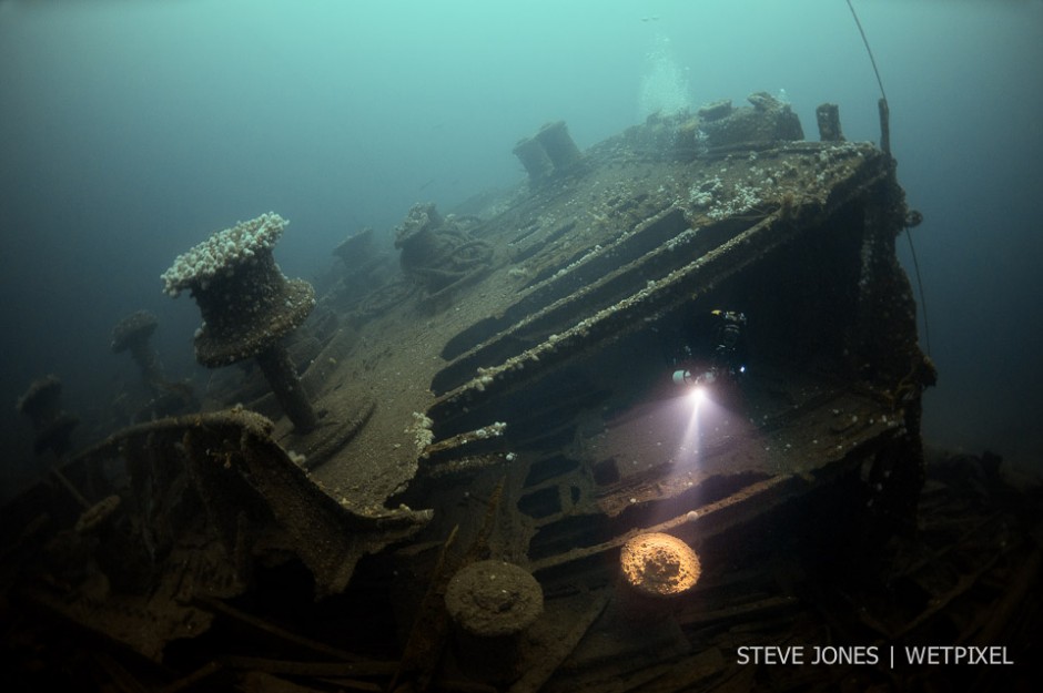 The 32,234 ton White Star Liner Justicia was used as a troopship in WW1. This image shows the vast foredeck, with capstans pushed up through the collapsing deck.