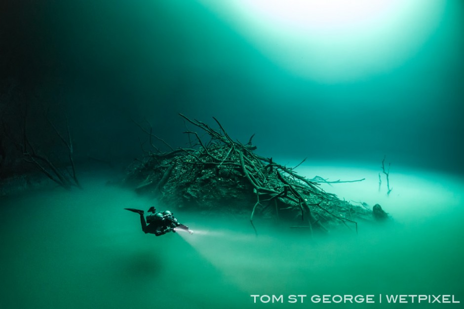 The debris mound at Cenote Angelita looks like an island surround by the 'river' of hydrogen sulfide gas.