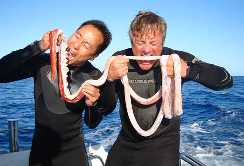 Tony Wu and Douglas Seifert enjoy some Architeuthis sp. giant squid sashimi